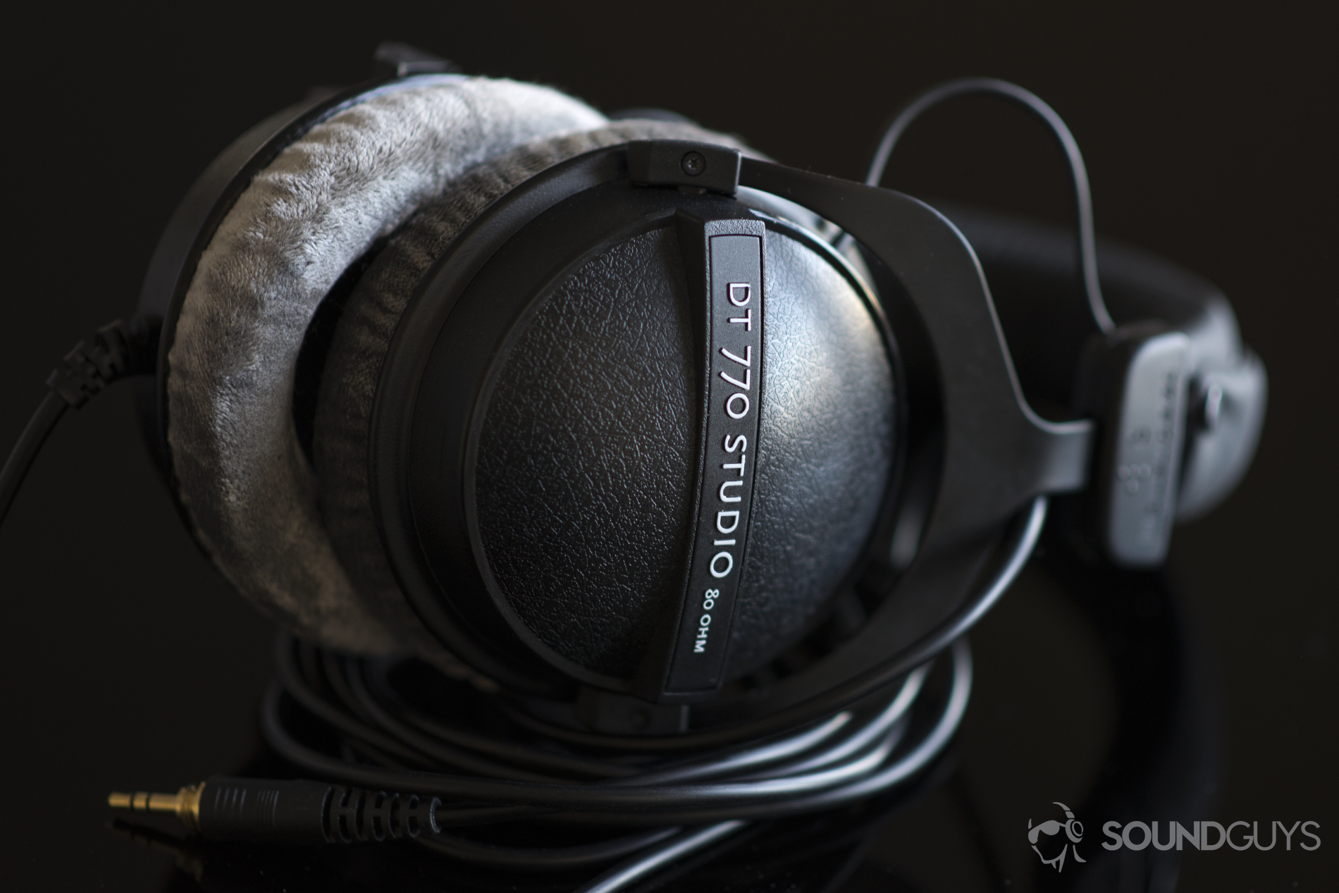 The Beyerdynamic DT 770 Pro (80Ω) have velour padding that is extremely comfortable.