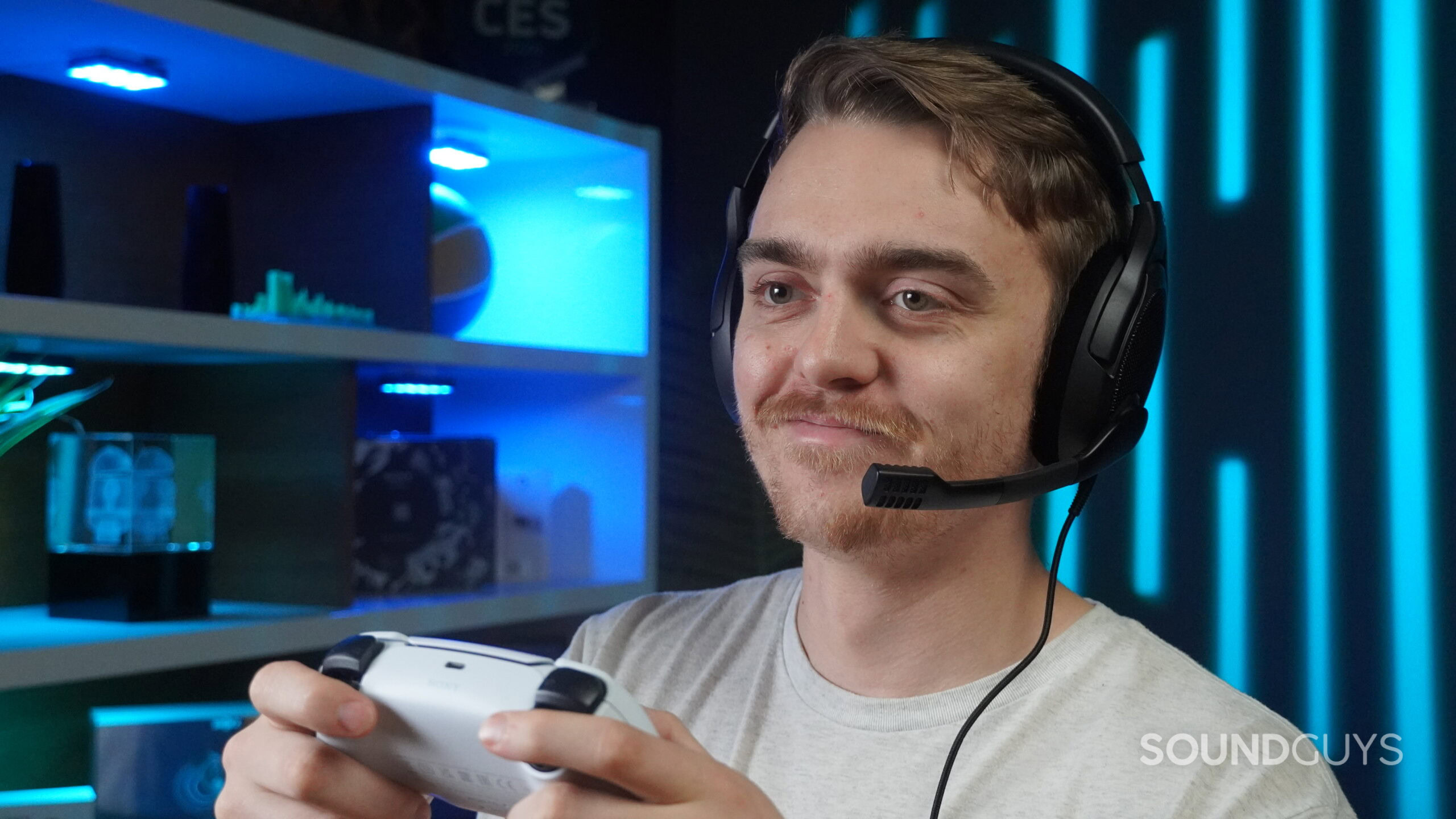 a handsome man playing video games