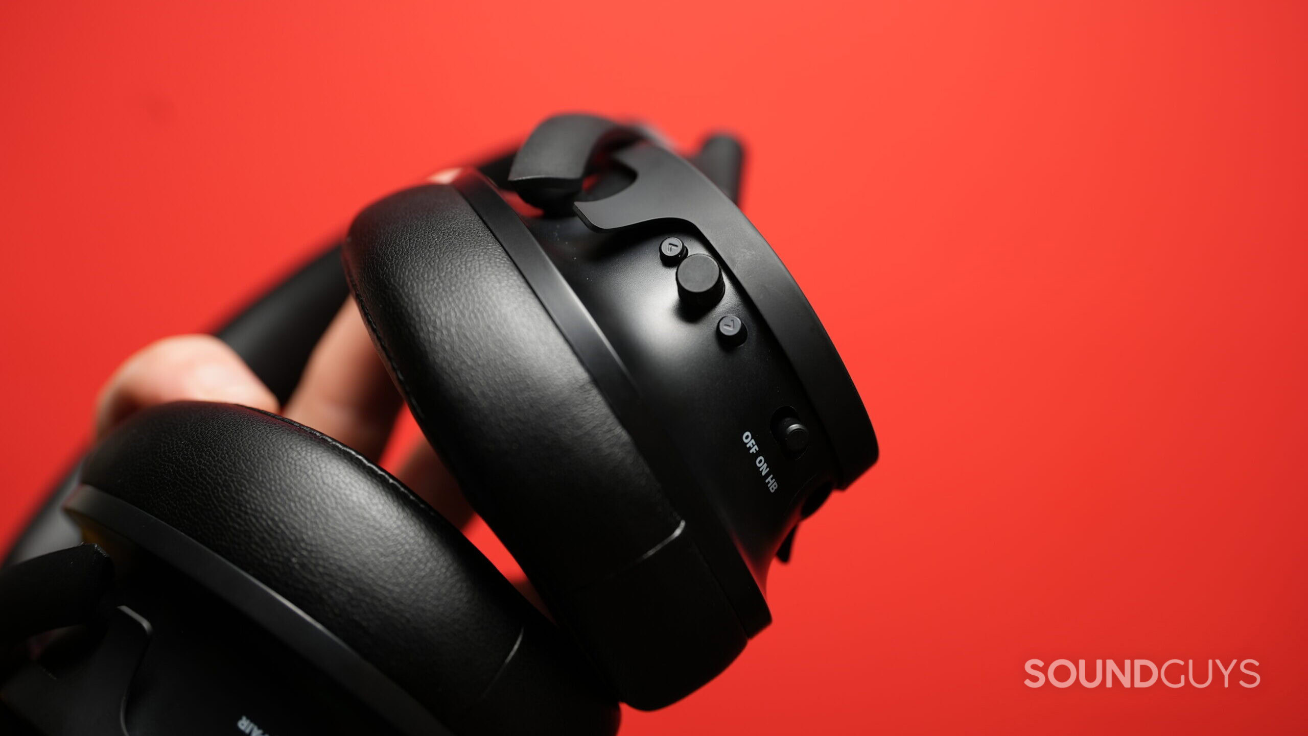 Top down photo of the Heavy H1H headphones, showing a close up of the physical controls.