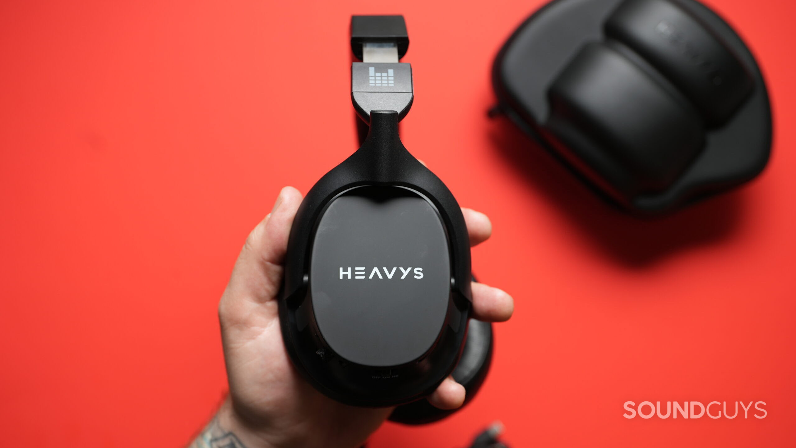 Top down photo of the Heavy H1H headphones replaceable outer shell showing &quot;Heavys&quot; logo