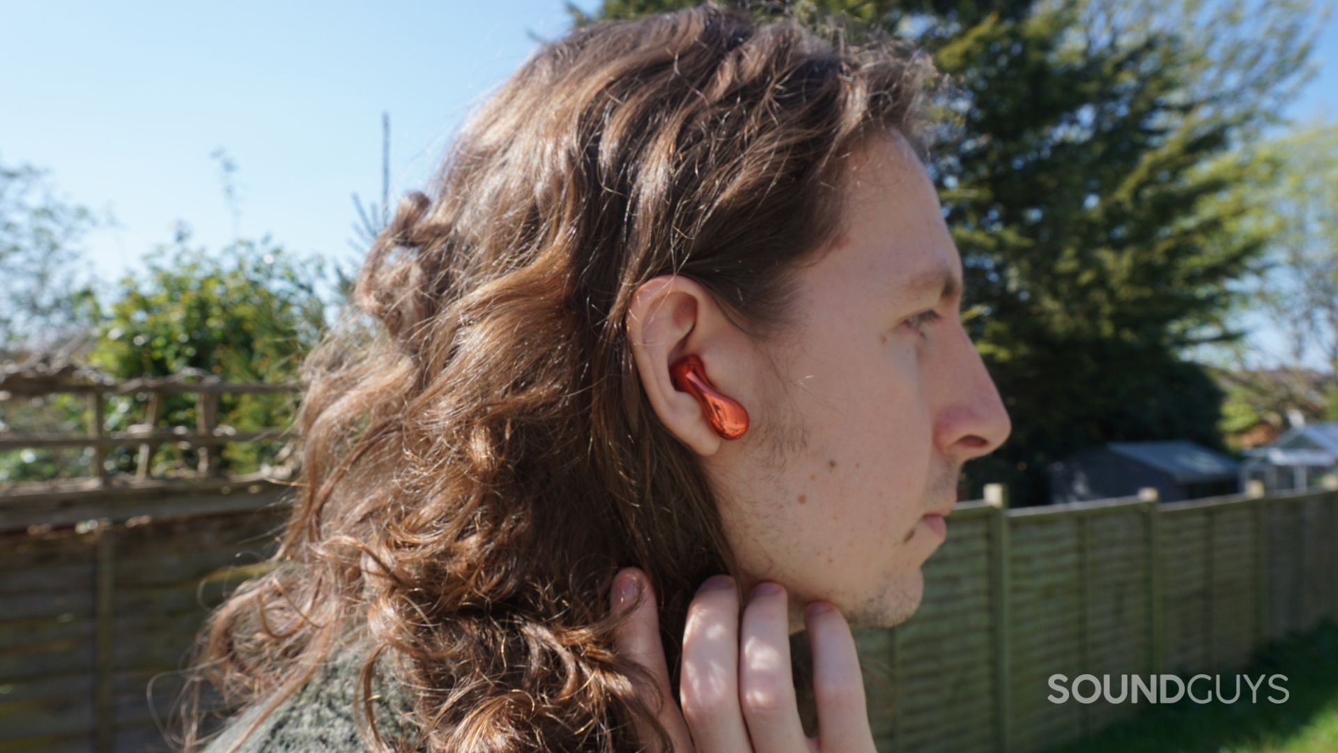 A photo of the HUAWEI FreeBuds 5 being worn.