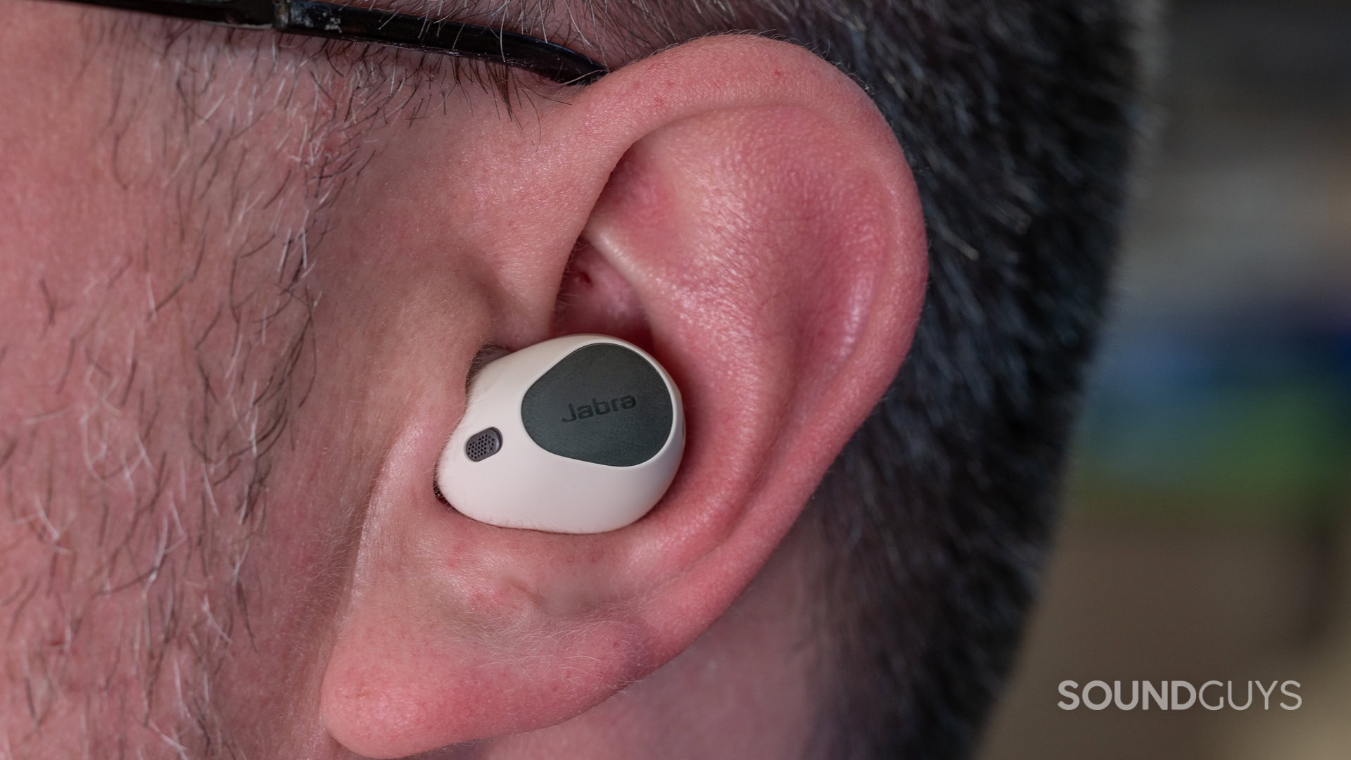 A photo of the Jabra Elite 10 Gen 2 in a man's ear.