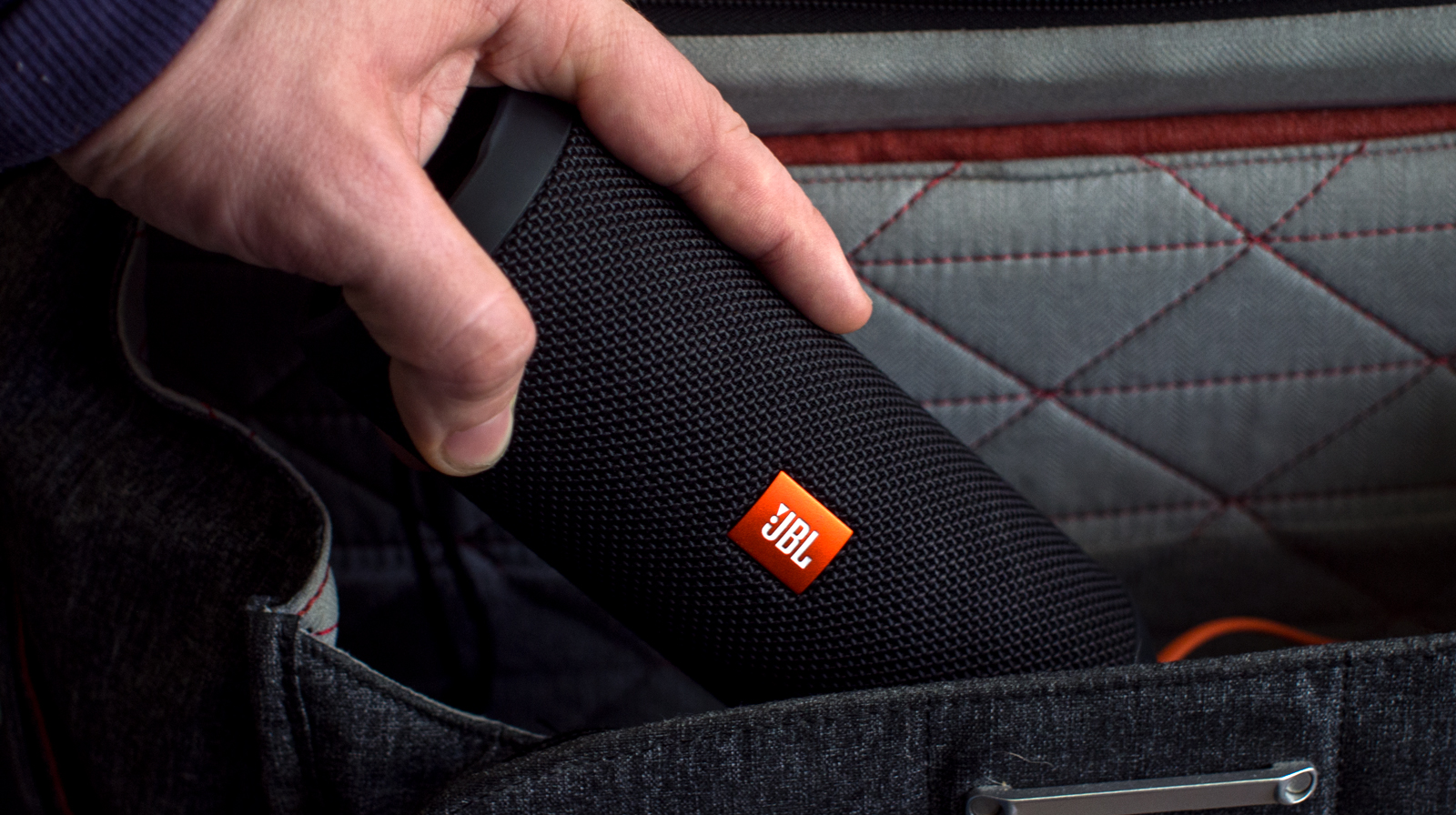 A photo of the JBL Flip 3 put into a bag.