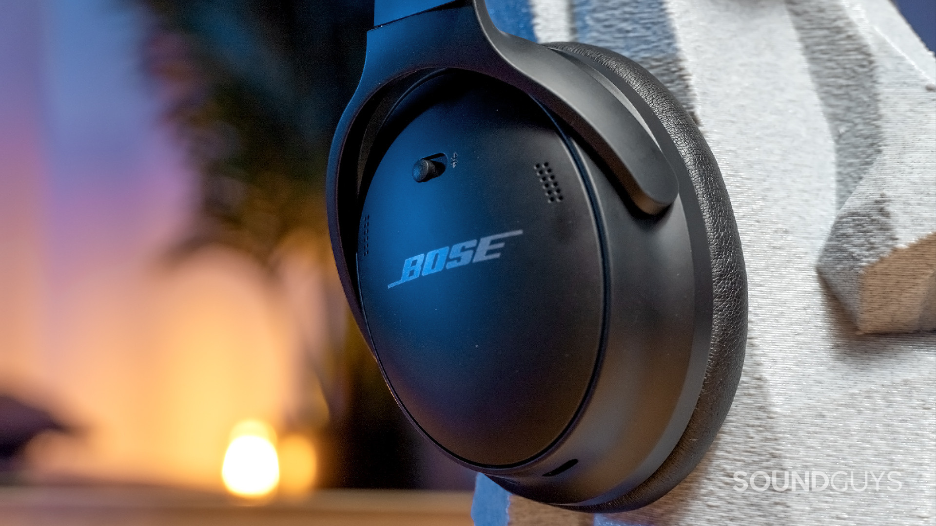 The Bose QuietComfort 45 resting atop a plastic head.