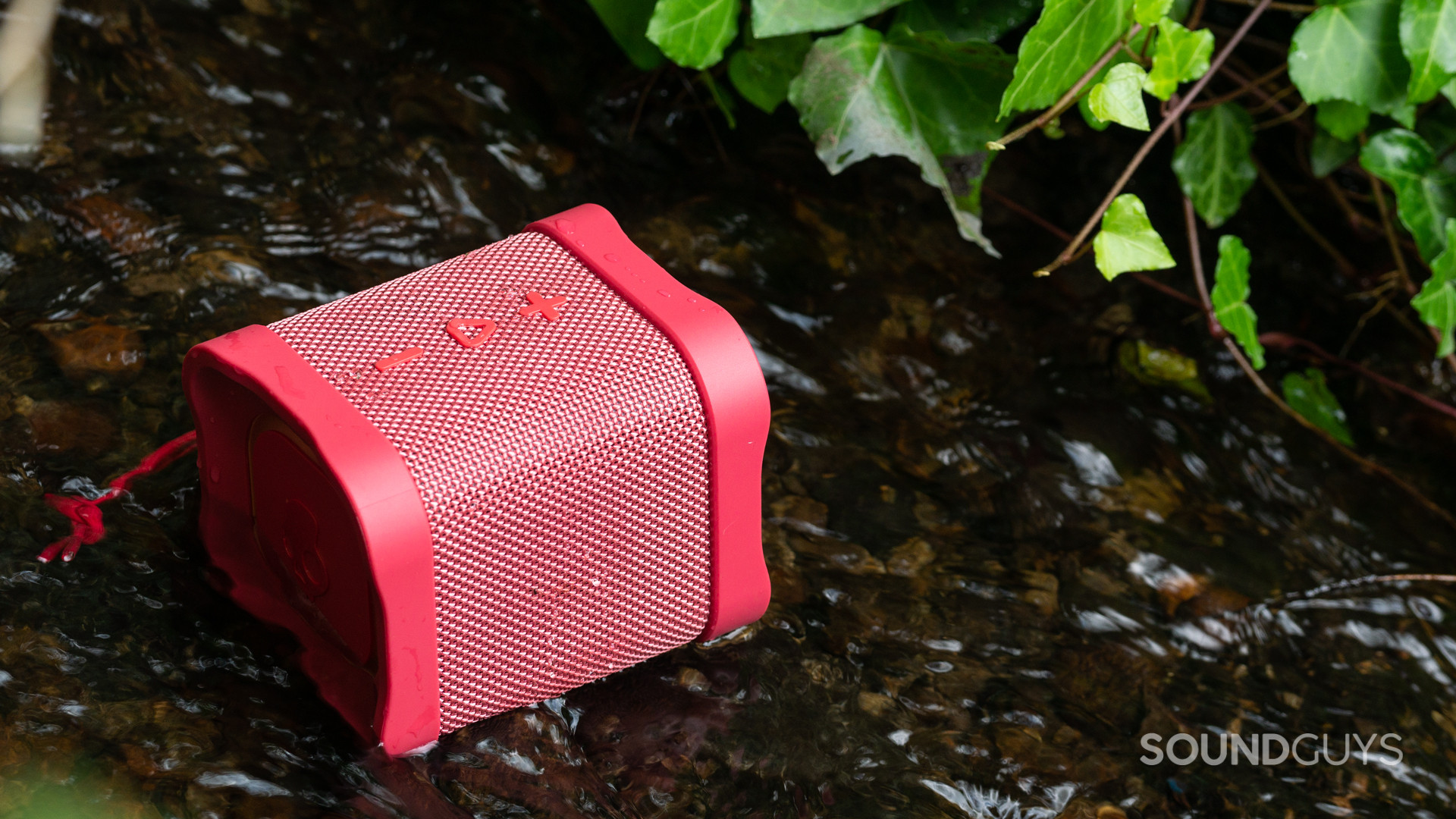 The Skullcandy Terrain Mini XT sits in a shallow creek, still functioning.