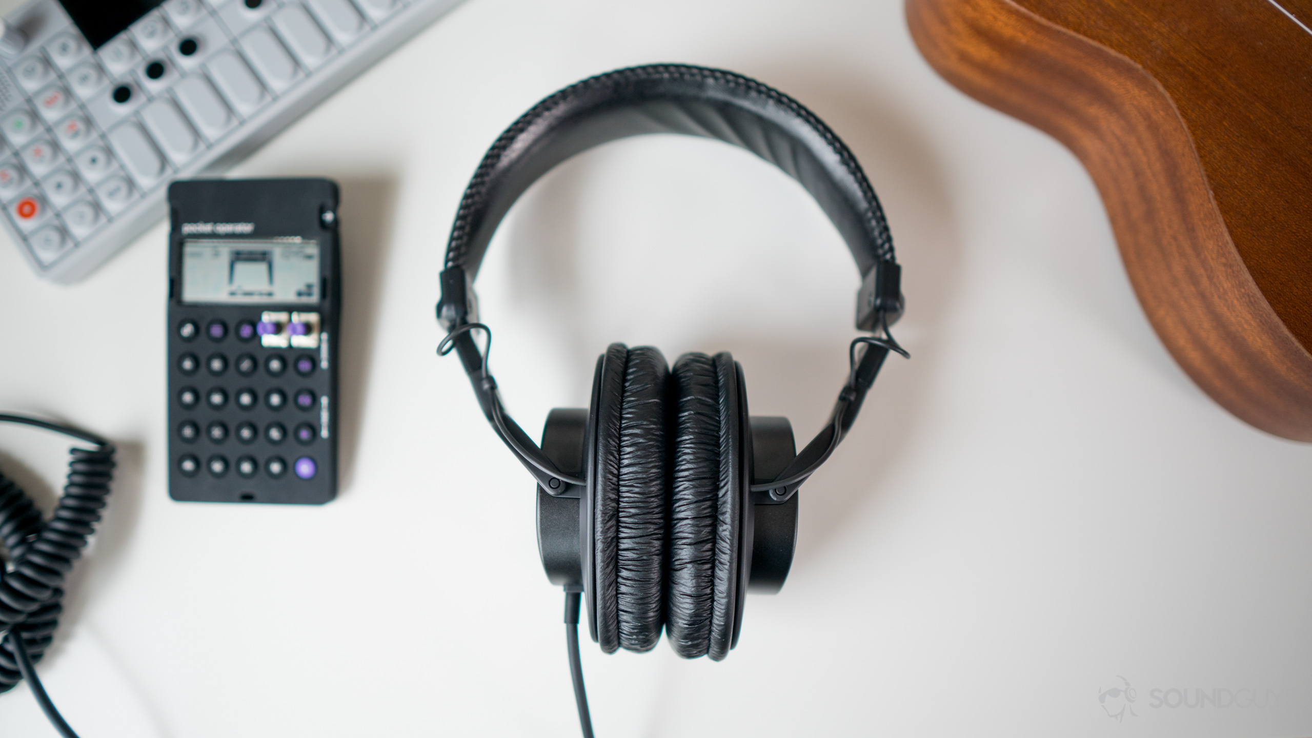 The Sony MDR-7506 headphones sitting next to some of my favorite instruments.