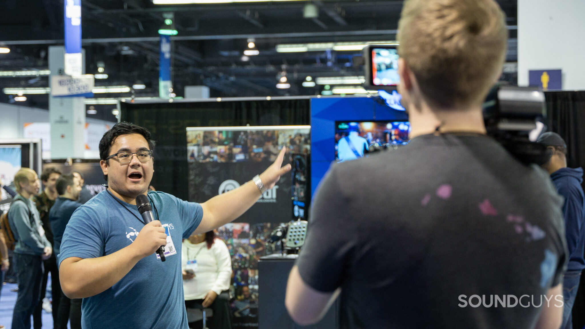 SoundGuys talking into a microphone.