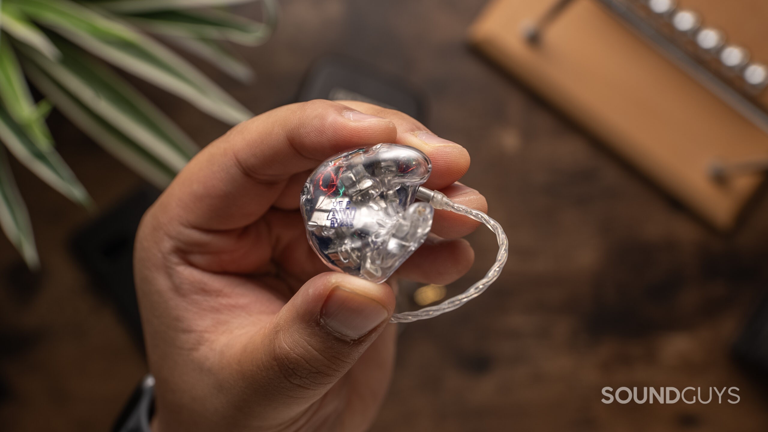 Ultimate Ears UE Premier showing transparent inside view.